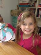 showing her hand sewing made at the school holiday workshop at Frolic in Fabric