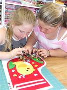 finding buttons to embellish their stocking